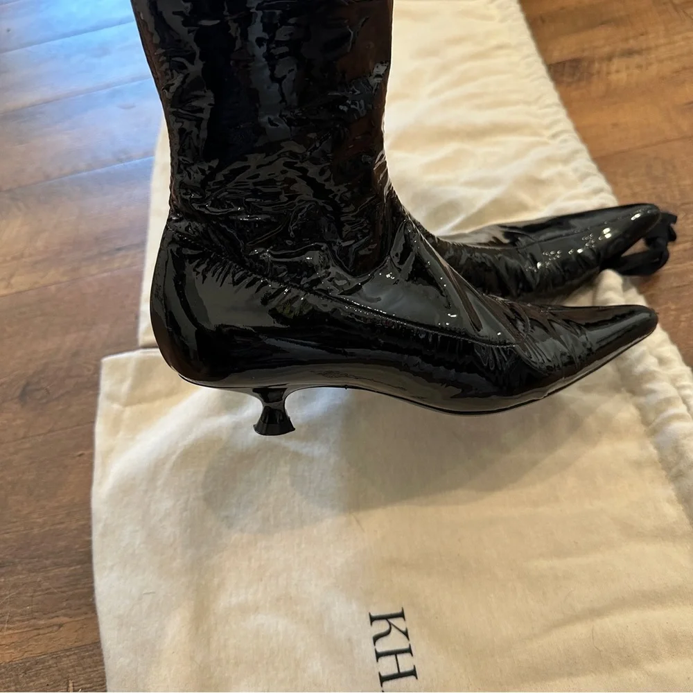 Khaite patent leather knee high boots